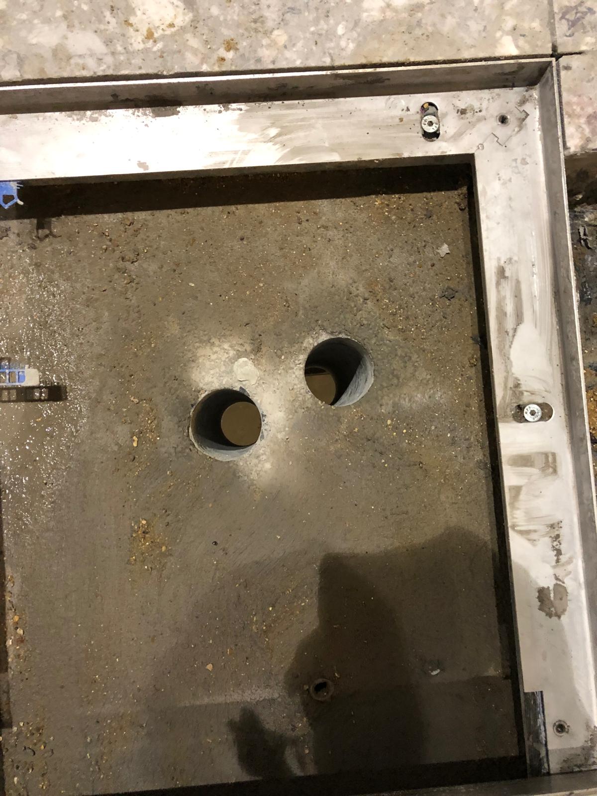 Precision core drilled holes in concrete
