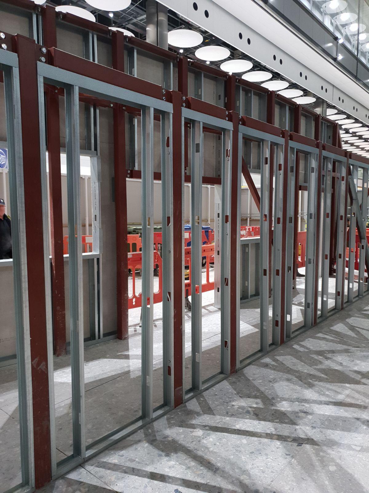 Metal stud partitioning and drylining